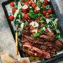 Tagliata med flankstek och tomatdressing